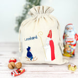 Nikolaussackerl bestickt mit hl. Nikolaus und Kind auf Schlitten in dunkelblau