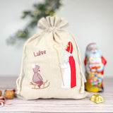 Nikolaussackerl bestickt mit hl. Nikolaus und Kind auf Schlitten in roas