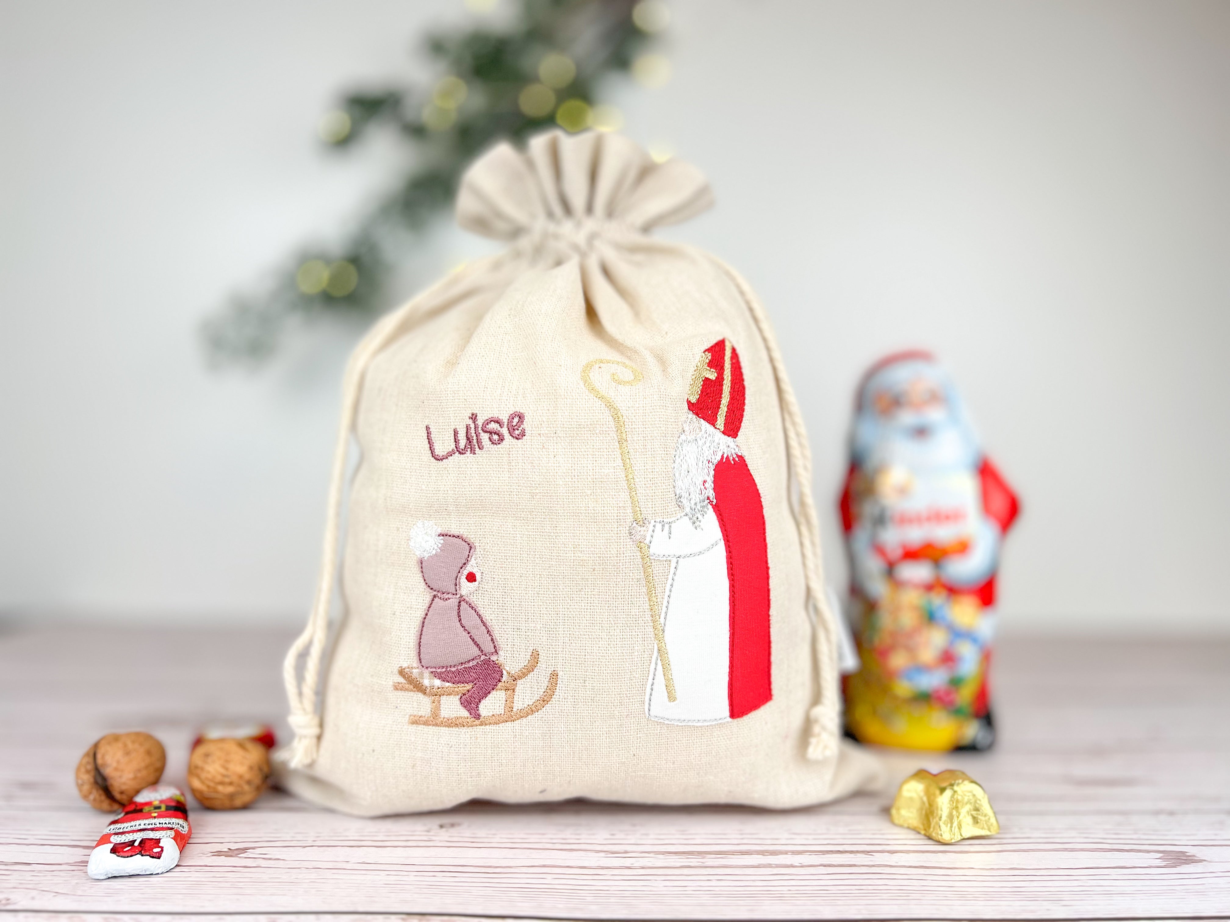 Nikolaussackerl bestickt mit hl. Nikolaus und Kind auf Schlitten in roas